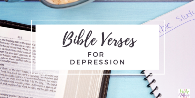 Bible on blue wood table with coffee cup and notebook, bible verses for depression