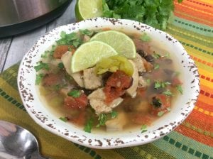 Weight Watchers Zero Point Soup - Jerk chicken soup in a bowl with lime.