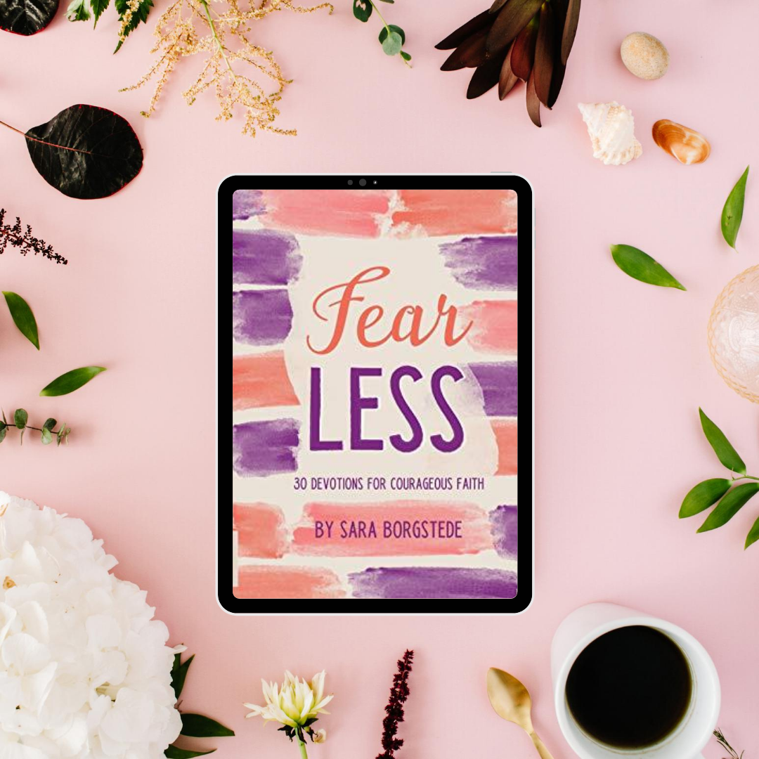 Fear Less book on shelf with coffee