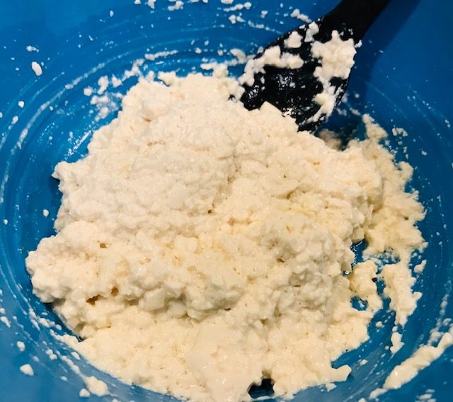 mash tofu to create dough