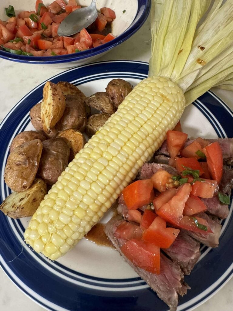 Grilled flank steak with bruschetta
