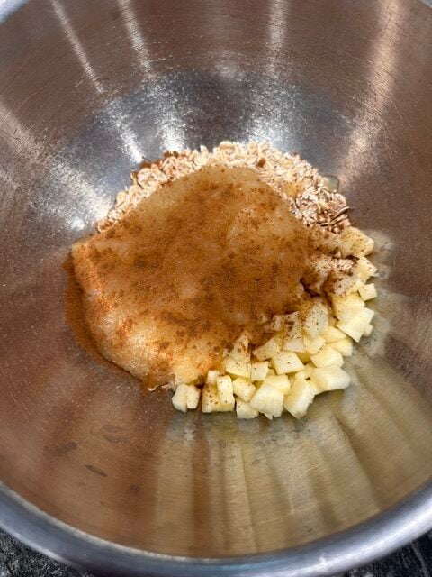 Ingredients in bowl for apple oat cookies