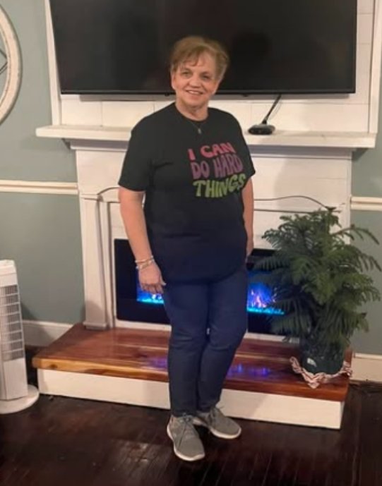 Holy Mess member in a black I Can Do Hard Things t-shirt